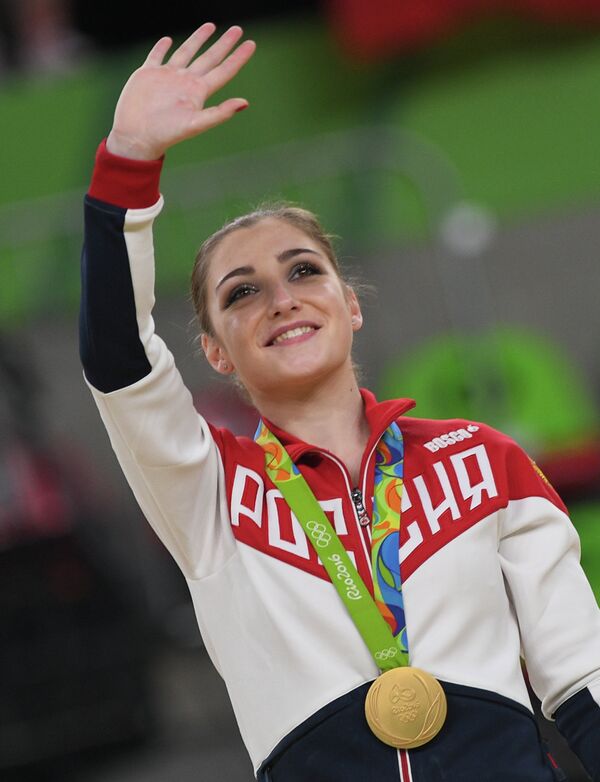Олимпийская чемпионка Рио-2016 гимнастка Алия Мустафина Олимпийская чемпионка Рио-2016 гимнастка Алия Мустафина