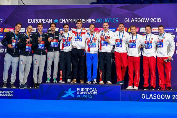 Призеры мужской эстафеты 4 по 100 метров на чемпионате Европы в Глазго Призеры мужской эстафеты 4 по 100 метров на чемпионате Европы в Глазго