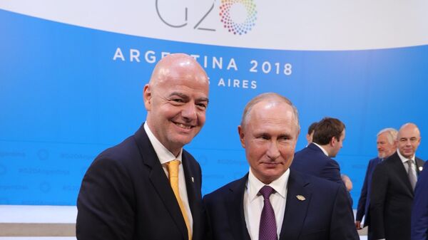 Джанни Инфантино (слева) и Владимир Путин (справа) Джанни Инфантино (слева) и Владимир Путин (справа)