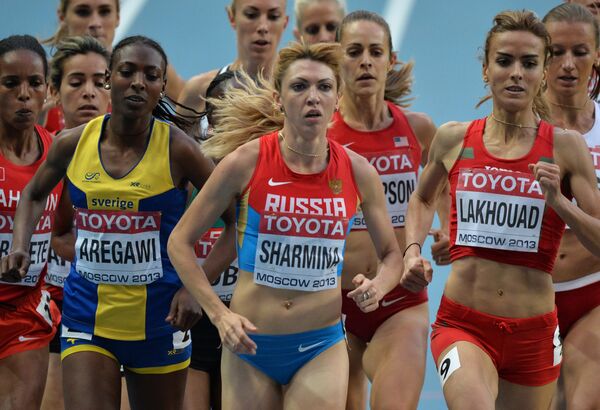 Российская спортсменка Екатерина Шармина (в центре) Российская спортсменка Екатерина Шармина (в центре)