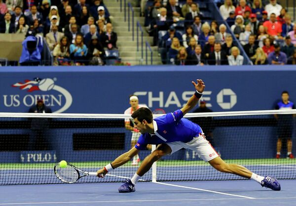 Финальный матч US Open между Новаком Джоковичем (на первом плане) и Роджером Федерером Финальный матч US Open между Новаком Джоковичем (на первом плане) и Роджером Федерером